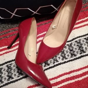Red patent leather pumps